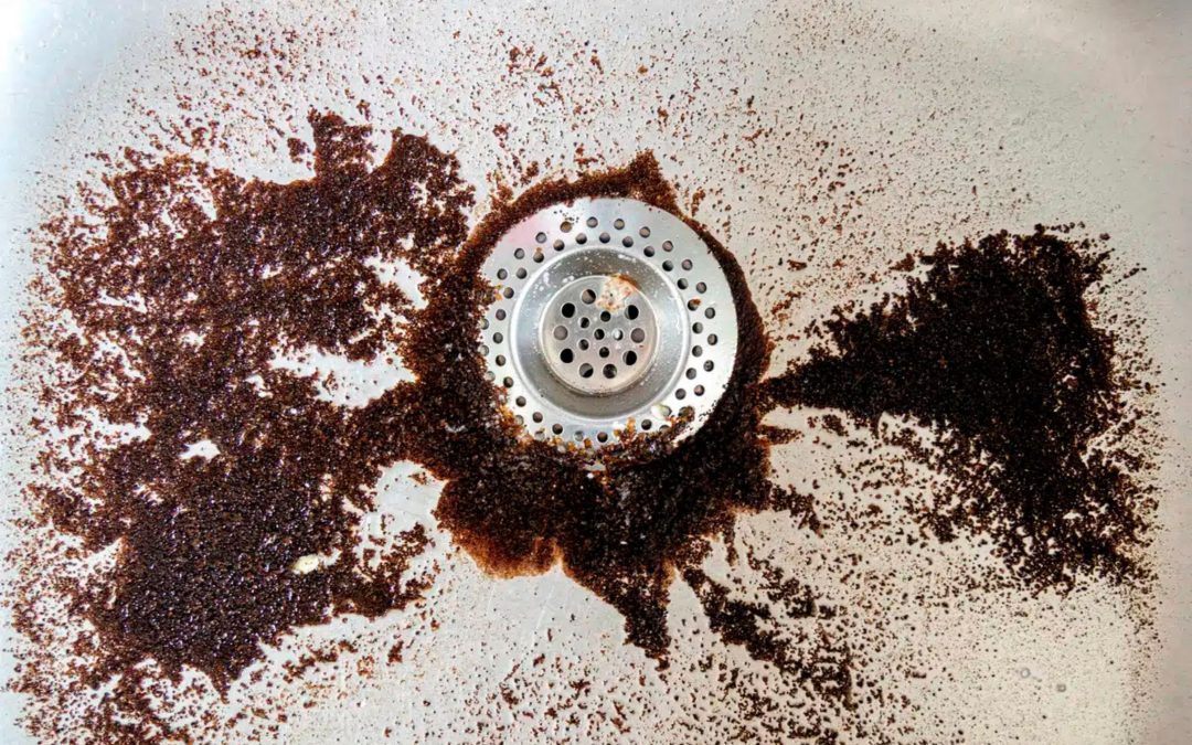 can coffee grounds go down the sink